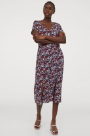 Robe à boutons 12.99 €