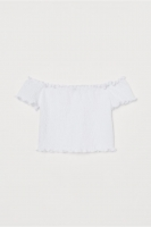 Top épaules nues smocké 2.99 €