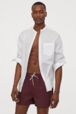 Short de bain court 6.99 €