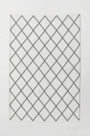 Grand tapis tissé jacquard 99.99 €