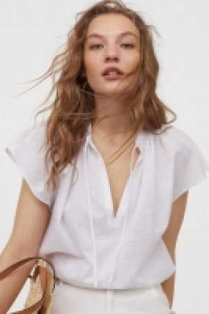 Blouse avec liens à nouer 8.99 €