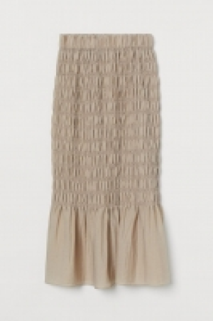 Jupe smockée 24.99 €