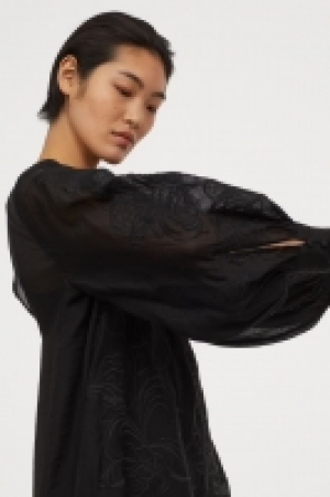 Tunique en lyocell mélangé 29.99 €
