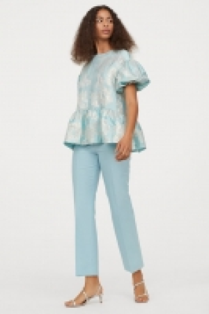 Pantalon 7/8 en laine mélangée 34.99 €