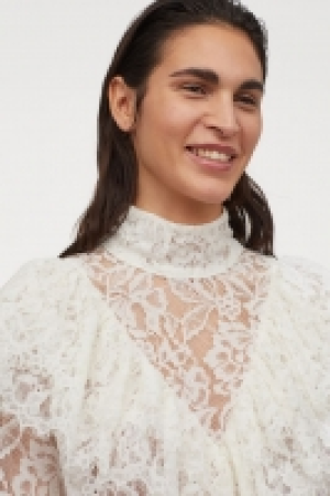 Blouse volantée en dentelle 24.99 €