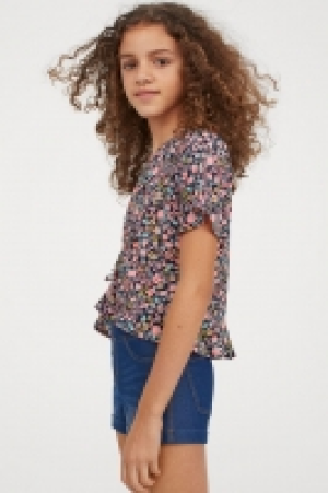 Blouse à volants 7.99 €