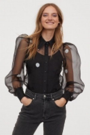 Blouse à manches bouffantes 19.99 €