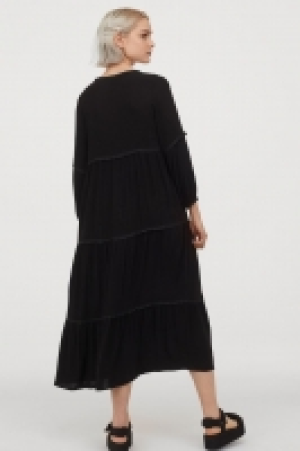 Robe à galon pompons 24.99 €