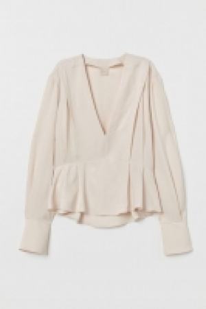 Blouse à encolure en V 24.99 €