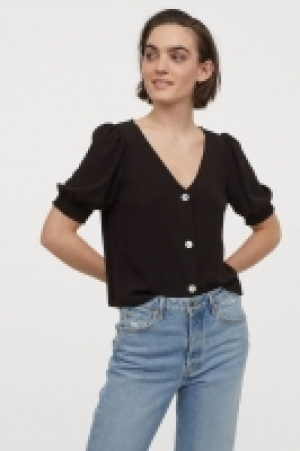 Blouse à manches bouffantes 4.99 €