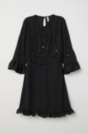 Robe avec perles fantaisie 18.99 €