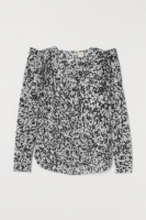 Blouse à manches bouffantes 17.99 €