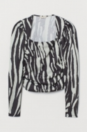 Top à manches bouffantes 12.99 €