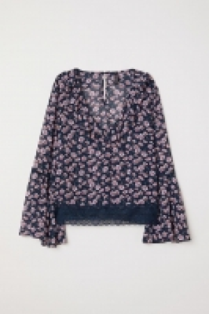 Blouse à encolure en V 11.99 €