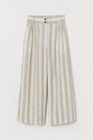 Pantalon large 18.99 €