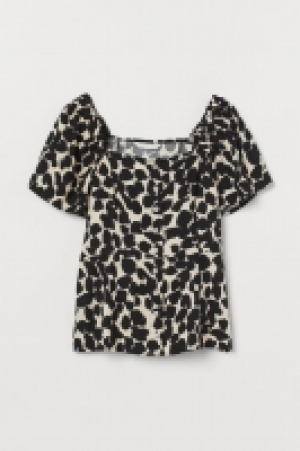 Blouse à manches bouffantes 9.99 €