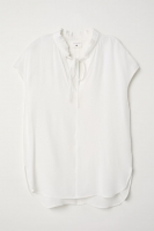 Blouse à col volanté 7.99 €