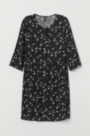 Robe à boutons 14.99 €