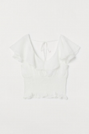 Top volanté avec smocks 8.99 €