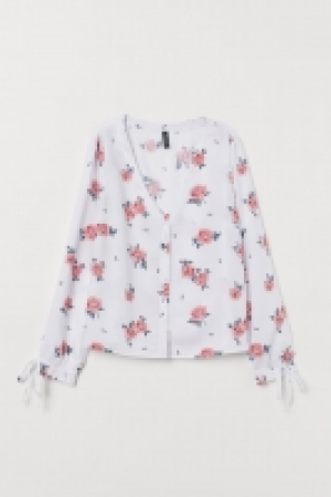 Blouse à boutons 8.99 €