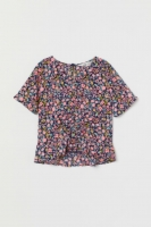 Blouse à volants 7.99 €
