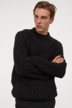 Pull en maille torsadée 17.99 €