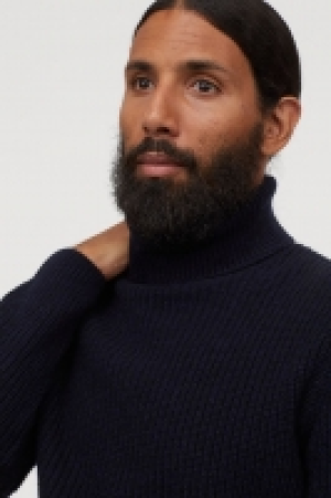 Pull col roulé en laine 59.99 €