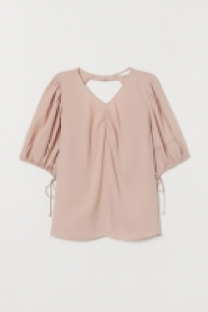Blouse à manches bouffantes 5.99 €