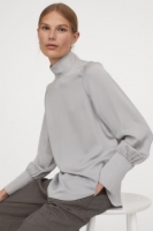 Blouse en soie mélangée 47.99 €