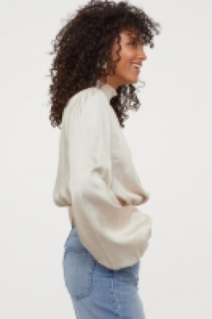 Blouse à smocks 34.99 €