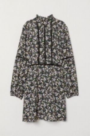 Robe à col volanté 8.99 €