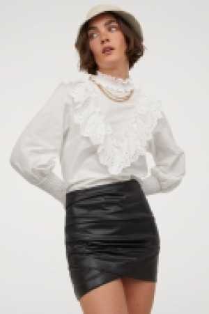 Mini jupe drapée 19.99 €