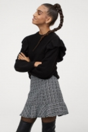 Mini-jupe volantée 19.99 €