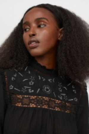 Blouse avec broderies 29.99 €
