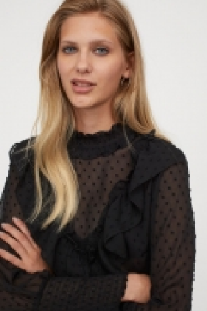Blouse à smocks 24.99 €