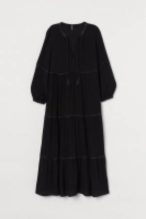 Robe à galon pompons 17.99 €