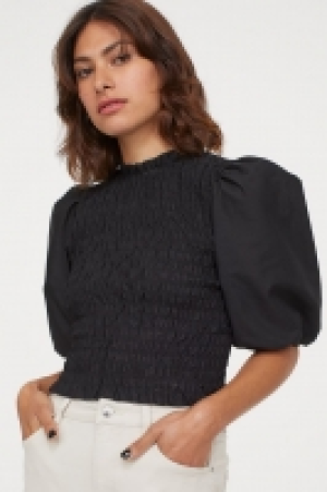 Blouse smockée 14.99 €