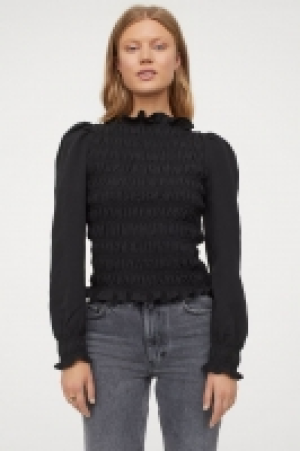 Blouse smockée 10.99 €