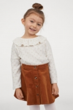 Top à volant en maille côtelée 6.99 €
