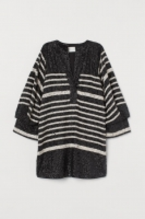 Robe courte à paillettes 119.40 €