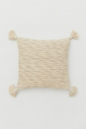 Housse de coussin à pompons 14.99 €