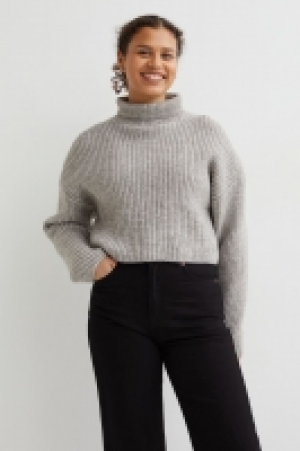 Pull col roulé court 17.99 €