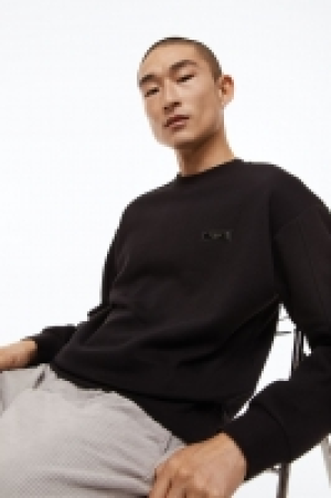 Sweat Relaxed Fit avec applications 12.99 €