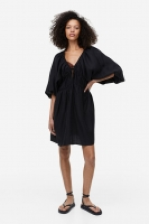 HM  Robe oversize en lyocell mélangé