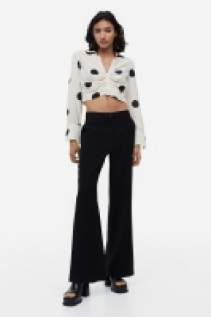 Pantalon évasé 14.99 €