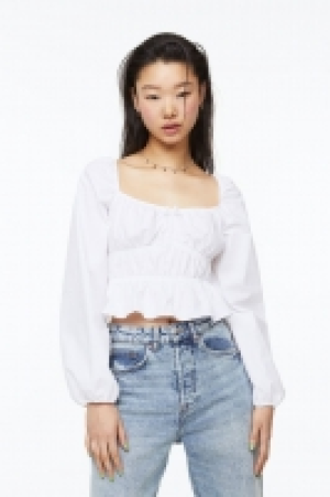 Blouse péplum à manches ballon 8.99 €