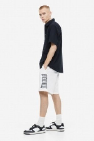 Short Relaxed Fit en molleton imprimé 8.99 €