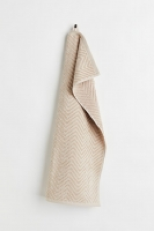 HM  Serviette à motif chevron