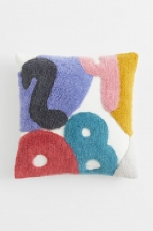 HM  Housse de coussin à motif tufté