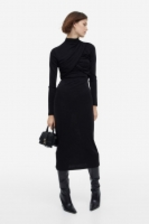 HM  Robe moulante drapée